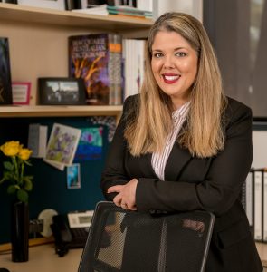 A photo of Mrs Emily Goforth, new Tranby Principal at her desk.