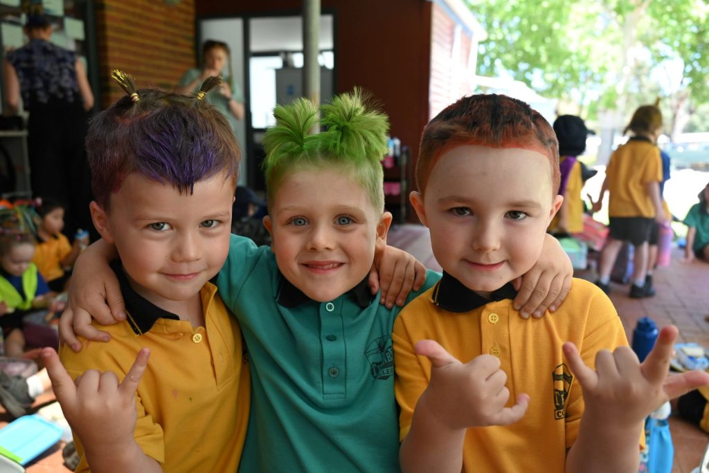 Three kindy students with crazy hairstyles